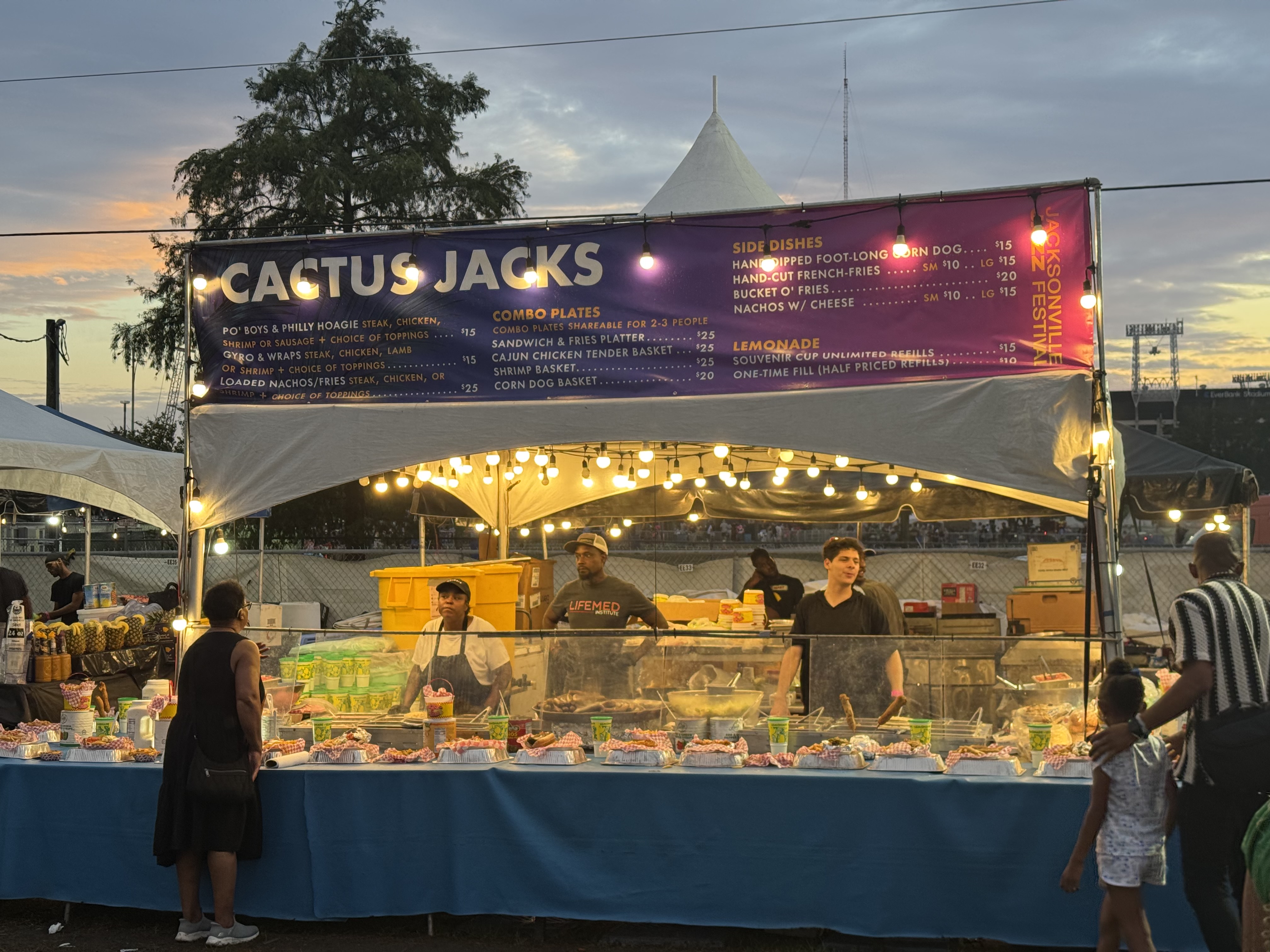 Cactus Jacks booth with full menu display and pricing